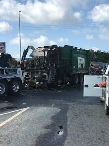 Vehicle Strikes Police Car Responding to Trash Truck Fire in Seaford